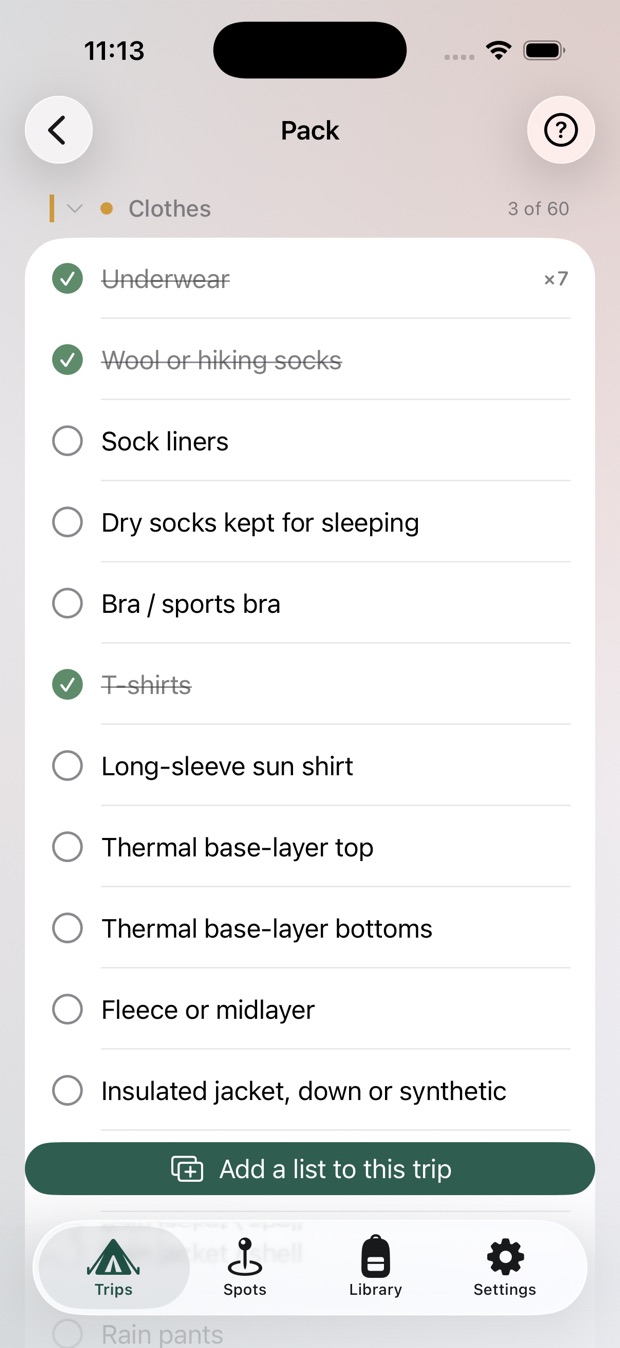 A packing checklist grouped into Clothes, items checked off as they're packed